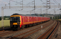 325004